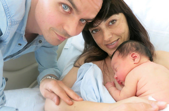 Sara Morgan-Beckett with Husband and Newborn