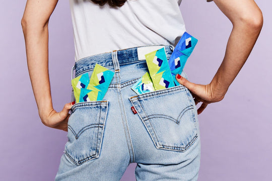 Woman with Condoms in Back Jeans Pockets