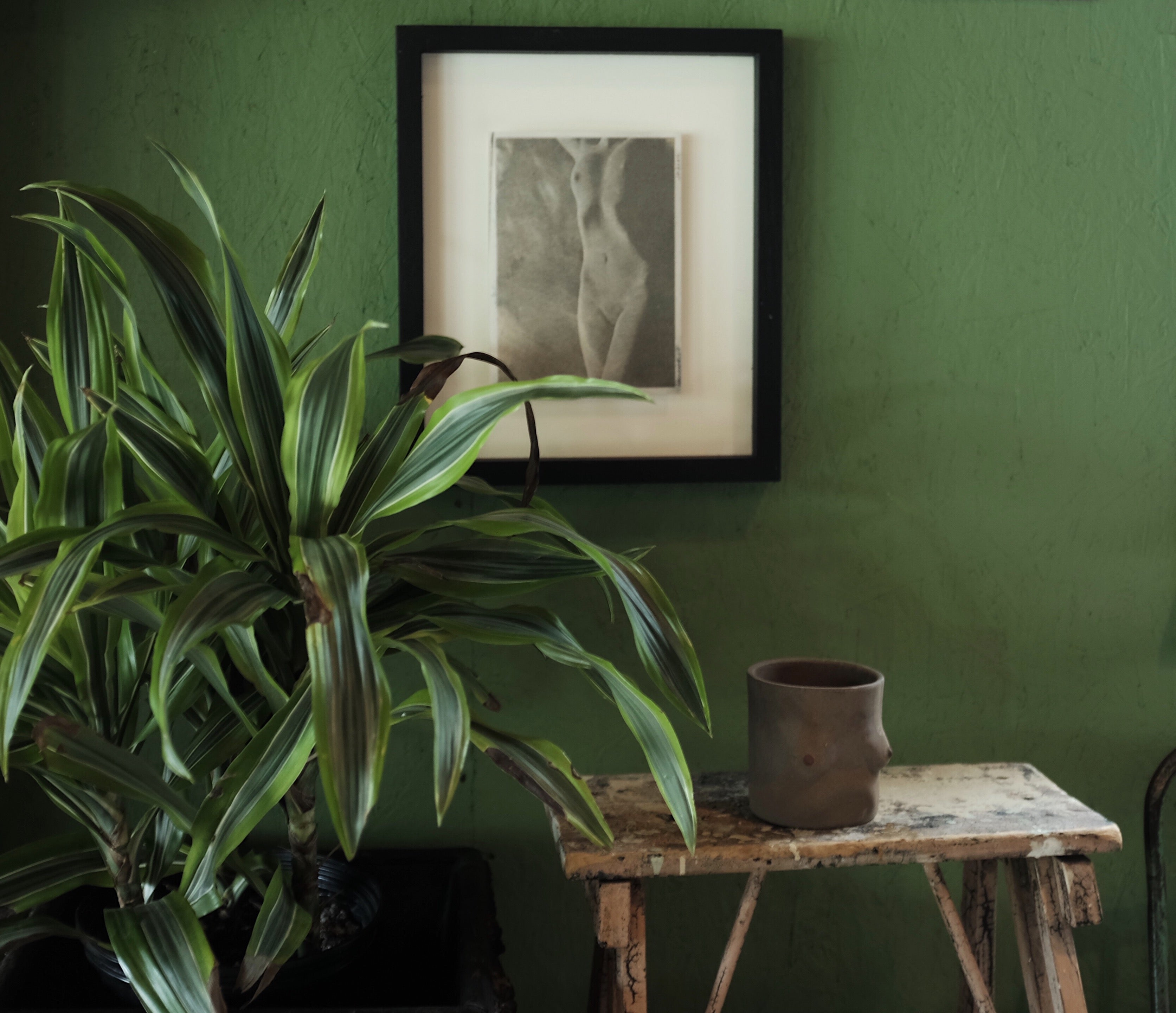 Nude Portrait Hanging in Hallway