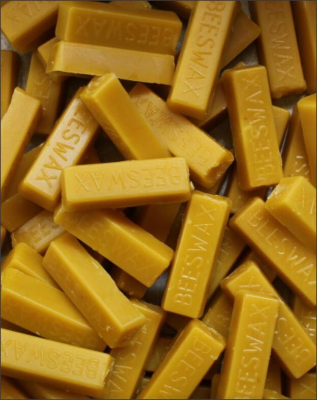 10-1_oz_bars_of_100_pure_american_beeswax_filtered_blocks_never_cut_or_dyed_1.jpg